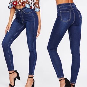 Dark wash skinny jeans.